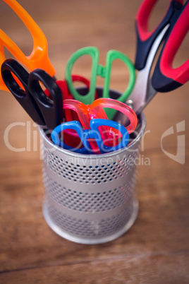 High angle view of scissors in desk organizer