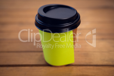 Close up of adhesive note stuck on disposable cup