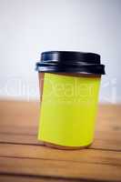 Close up of adhesive note stuck on disposable cup