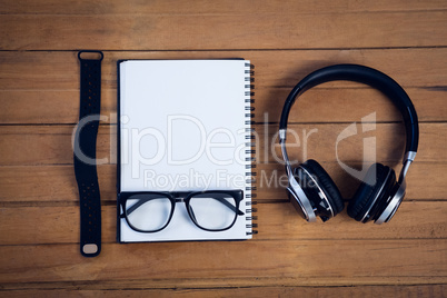 Overhead view of diary with personal accessories