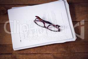 High angle view of eyeglasses on documents