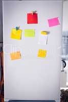 Sticky notes on refrigerator