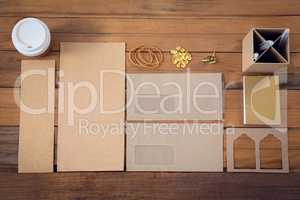 High angle view of office supplies with cardboard