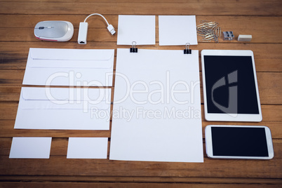 High agnle view of envelopes with technologies and office supply