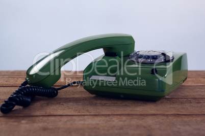 Vintage phone on wooden table