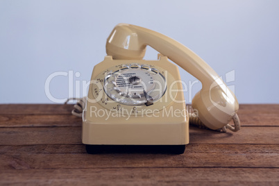 Vintage phone on wooden table