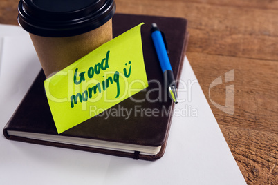 Black coffee with message on desk