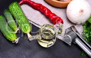 Olive oil and fresh vegetables for salad