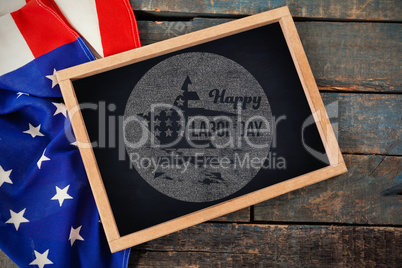 Composite image of digital composite image of happy labor day text on blue poster