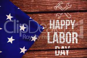 Composite image of digital composite image of happy labor day text with tools