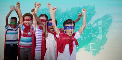 Composite image of children in superhero costumes