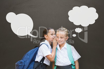 Student girls with speech bubbles whispering against grey background