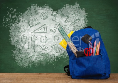 Schoolbag on Desk foreground with blackboard graphics of education icons drawings