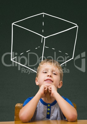 Student boy at table against green blackboard with school and education graphic