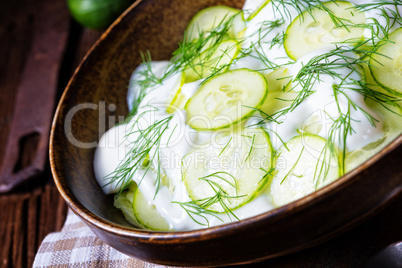 fresh cucumber salad with yogurt and young potatoes