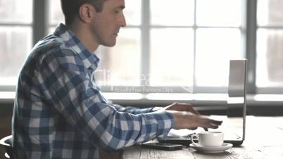 Man working on the laptop