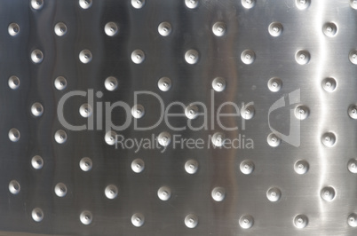 Metal plates with rivets background or texture photo