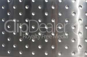 Metal plates with rivets background or texture photo