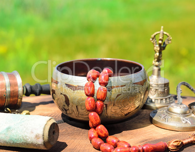 singing bowl with stone rosary