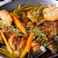 Grilled chicken wings with caramelized carrots