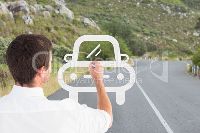 Business man drawing a car on the road