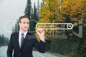 Business man drawing a search bar on the road