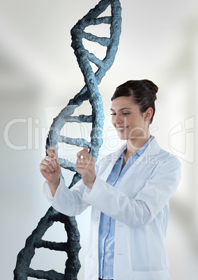 Happy doctor woman holding a glass with 3D DNA strand