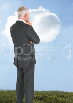 Businessman thinking with sky cloud
