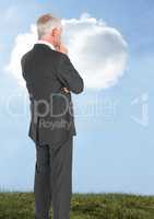 Businessman thinking with sky cloud