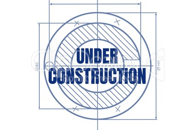 Under construction text against blueprint