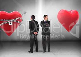 Heart in chains or heart with Businessman looking in opposite directions
