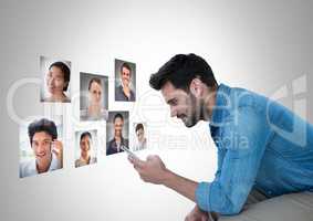 Man holding phone with Profile portraits of people contacts