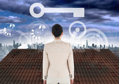 Key icon and interface and Businesswoman standing on Roof with city sky