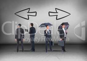 Left and right arrows and Group of Businessmen with umbrellas looking in opposite directions