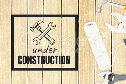 Under construction text against tools photo