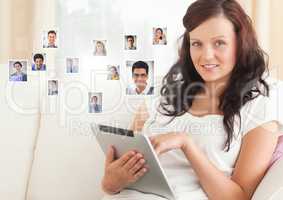 Woman holding phone with Profile portraits of people contacts