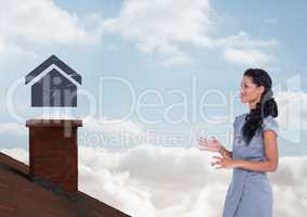 Home icon over roof chimney and Businesswoman standing on Roof with chimney and blue sky