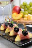 Canape of peach with jamon