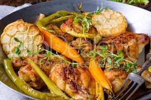 Grilled chicken wings with caramelized carrots