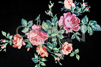 The pattern on fabric: a bouquet of roses.