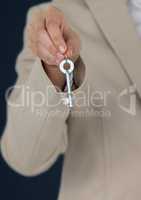 Business woman holding keys