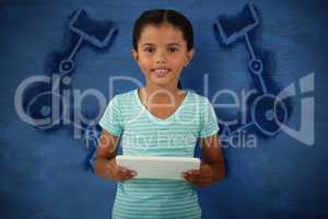 Composite image of portrait of cute smiling girl holding digital tablet