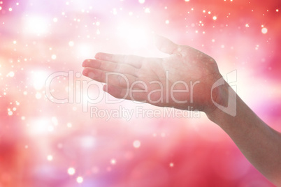 Composite image of cropped image of hand pretending to hold invisible object