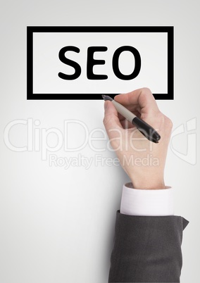 Hand interacting with SEO business text against white background