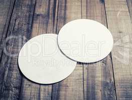 Two beer coasters