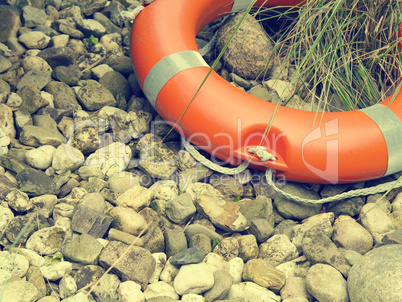Rescue belt on pebbles