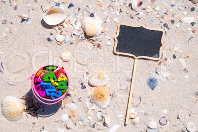 baby bucket with wooden letters