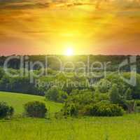 Green fields and bright sunrise