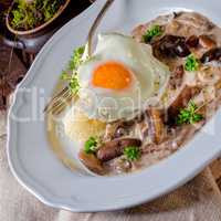 Forest mushroom sauce with fresh mushrooms, potato and poached e