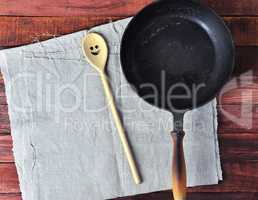 Empty black cast-iron frying pan